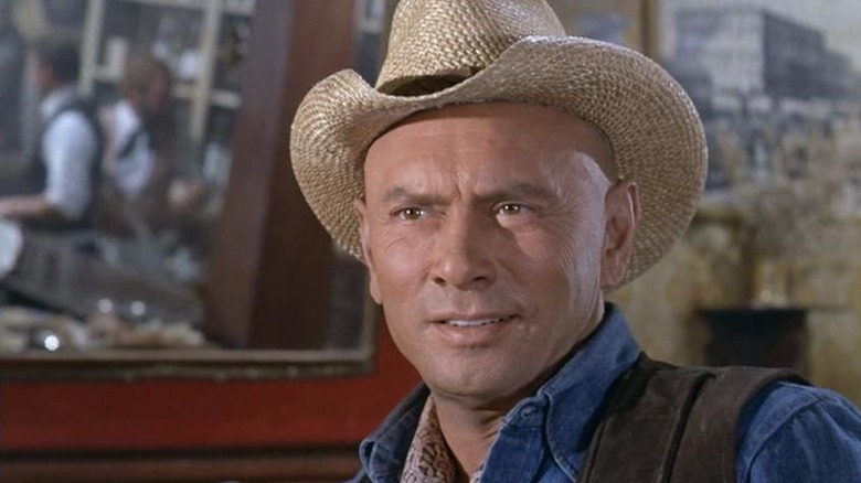 Yul Brynner as Jed Catlow in a cowboy hat in Catlow