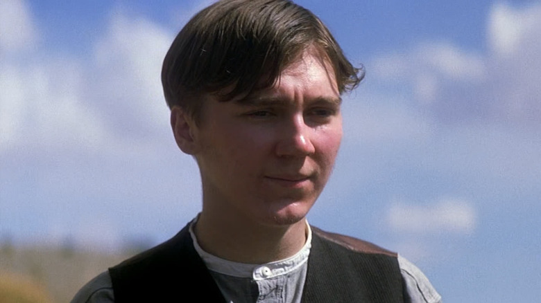 Paul Dano as Eli Sunday with blue sky behind him in There Will Be Blood