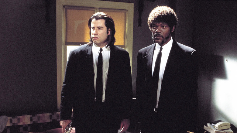 john travolta and samuel l jackson standing in suits in pulp fiction