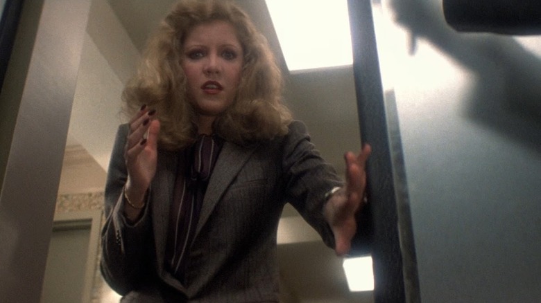 Nancy Allen finds murder in an elevator as Liz Blake in Dressed to Kill