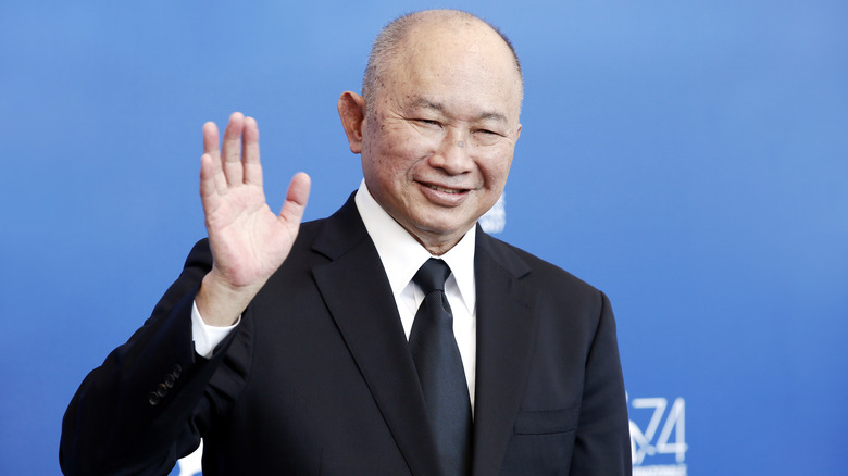 John Woo waving at a film festival