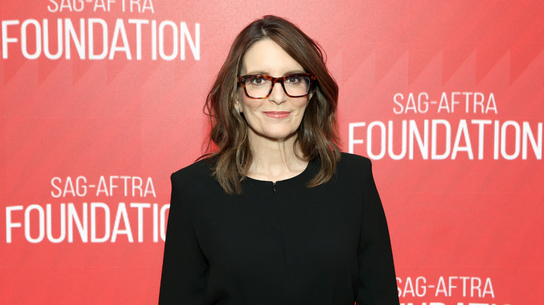 Tina Fey wearing glasses and a black top