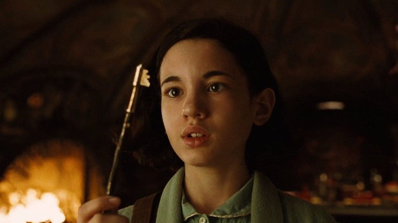 Ofelia holding up key in Pan's Labyrinth