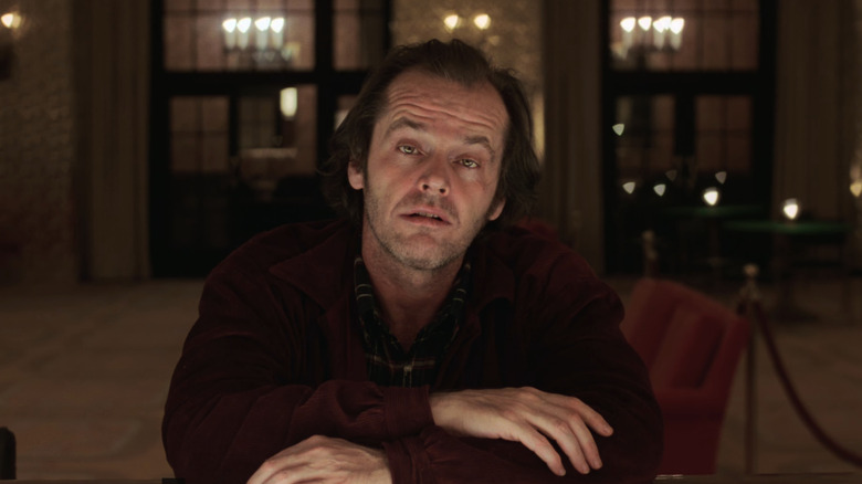Jack Nicholas as Jack Torrance sitting at a bar in The Shining
