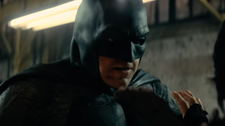 Batman confronts a villain