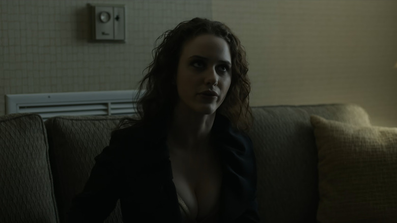 Rachel Posner (Rachel Brosnahan) sitting on a couch in House of Cards
