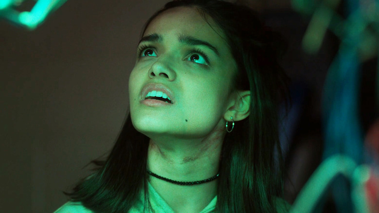 Rachel Zegler's Laura looks confused as she looks up in Y2K