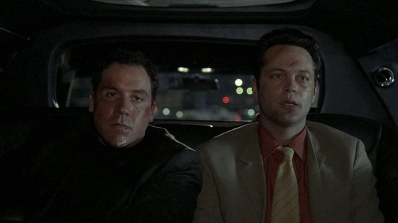 Bobby and Ricky sitting on the back seat of a car