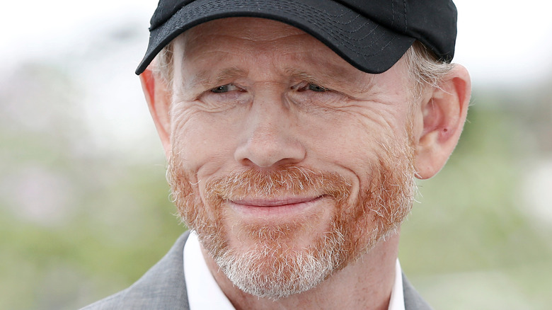 Ron Howard looking at the camera wearing hat