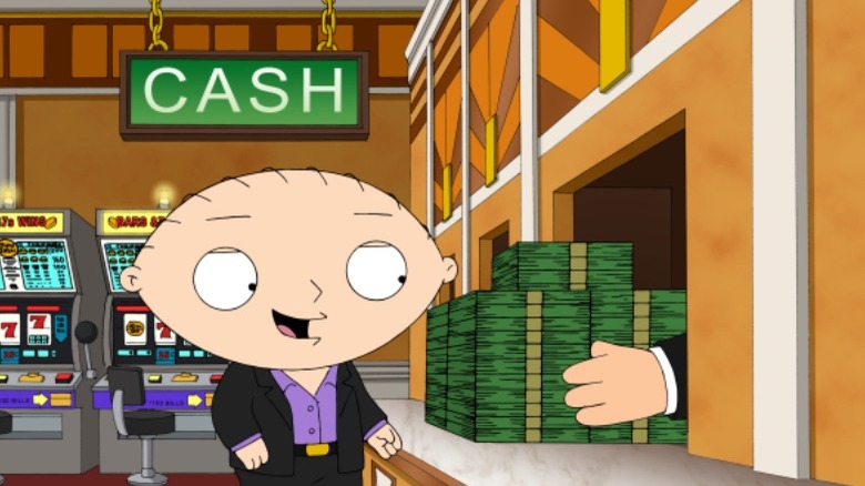 Stewie Griffin with pile of cash