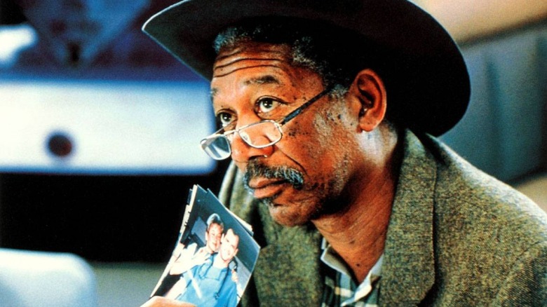 Charlie (Morgan Freeman) has a picture held in front of him in Nurse Betty