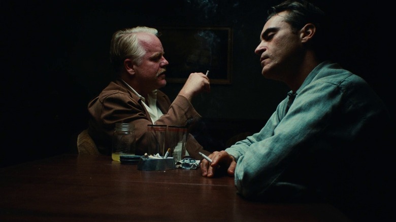 Joaquin Phoenix smokes cigarettes