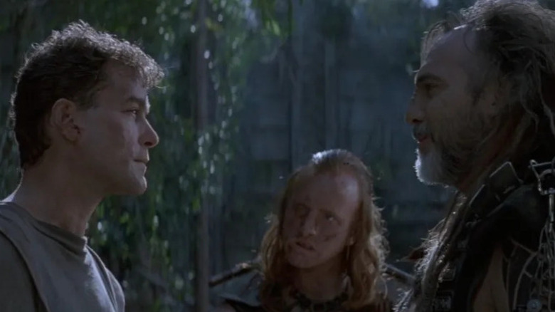 John Robbins staring at Walter Marek in No Escape