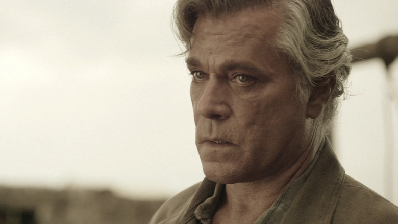 Ray Liotta's Lorca is seen in closeup as he stands outside in Texas Rising