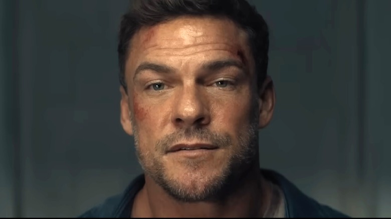 Jack Reacher looking like he's about to murder someone in Reacher