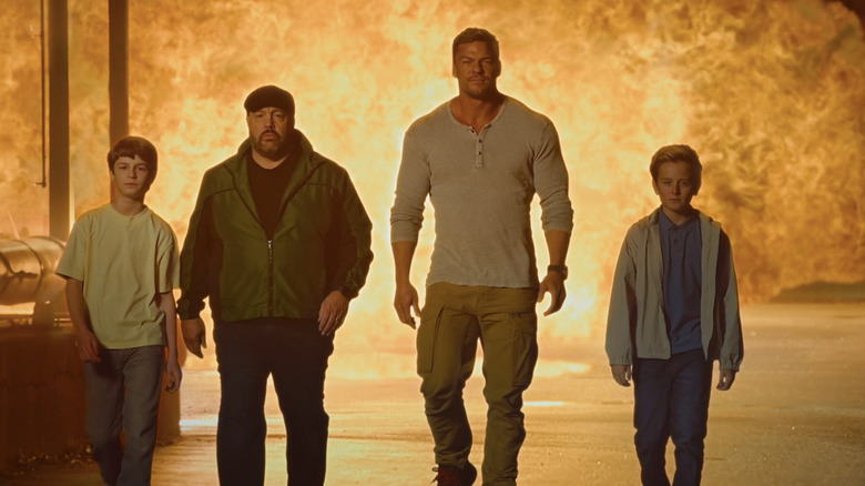 Benjamin Pajak's Lucas, Kevin James' Brian, Alan Ritchson's Jeff, and  Banks Pierce's CJ walk away from an explosion in Playdate