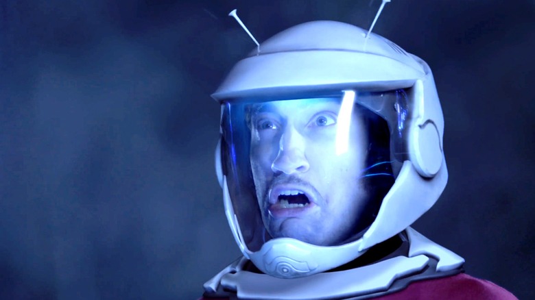 Gavin Free's Woody looks weirded out by something offscreen in Lazer Team