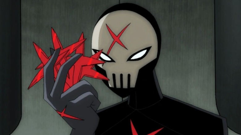 Red X holds his X batarangs in Teen Titans