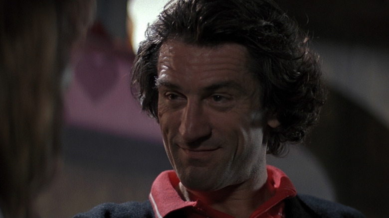 Robert De Niro in the role of Max Cadi smiling exciting in the Cape Fair