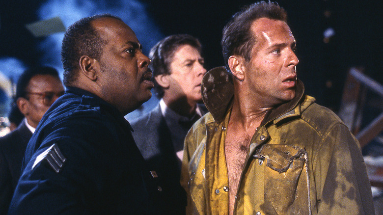 Reginald VelJohnson and Bruce Willis in Die Hard