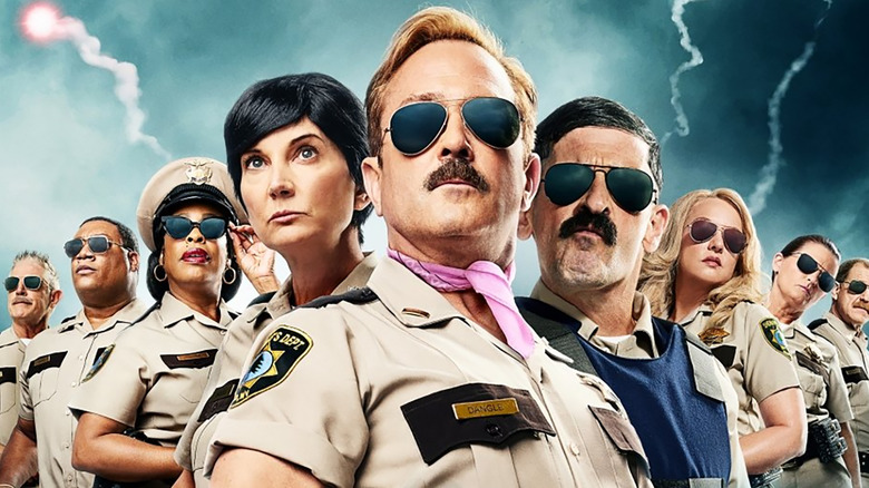 The cast of Reno 911 including Thomas Lennon, Kerri Kenney-Silver, Robert Ben Garant, Niecy Nash, and Wendi McLendon-Covey.