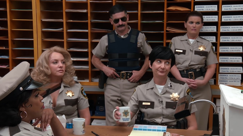 Still from Reno 911! The Hunt for QAnon