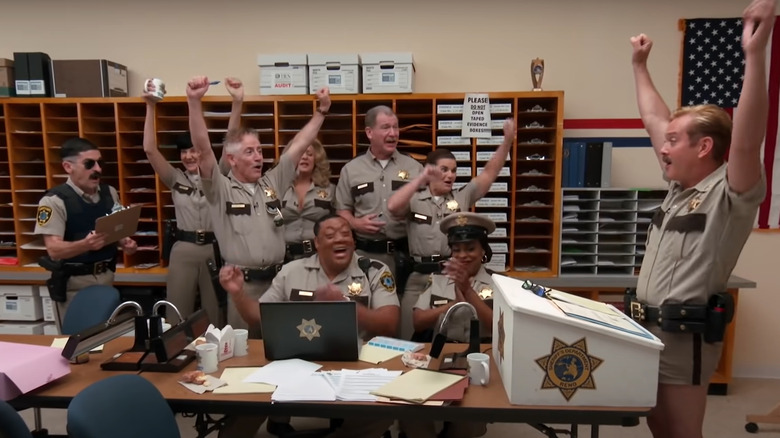 Still from Reno 911! The Hunt for QAnon