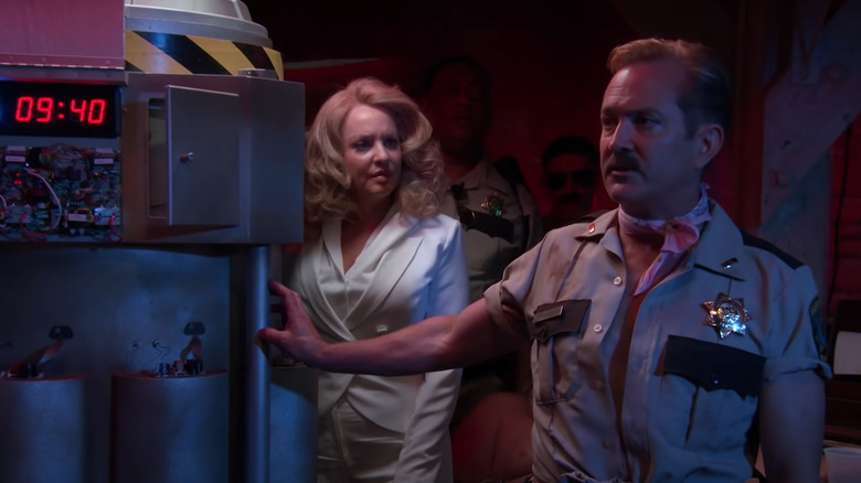 Still from Reno 911! The Hunt for QAnon