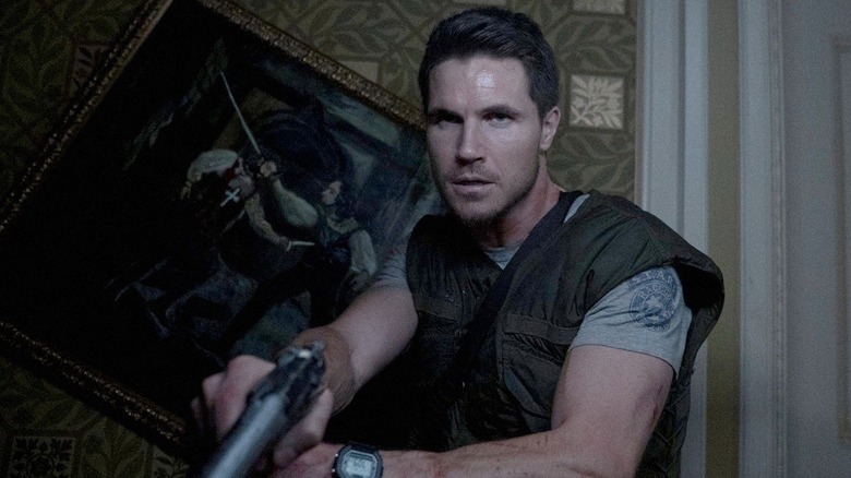 Robbie Amell as Chris Redfield in Resident Evil: Welcome to Raccoon City