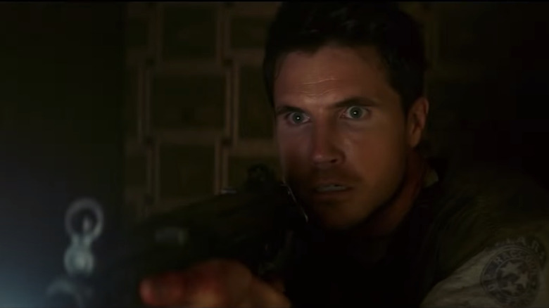 Robbie Amell as Chris Redfield in Resident Evil: Welcome to Raccoon City