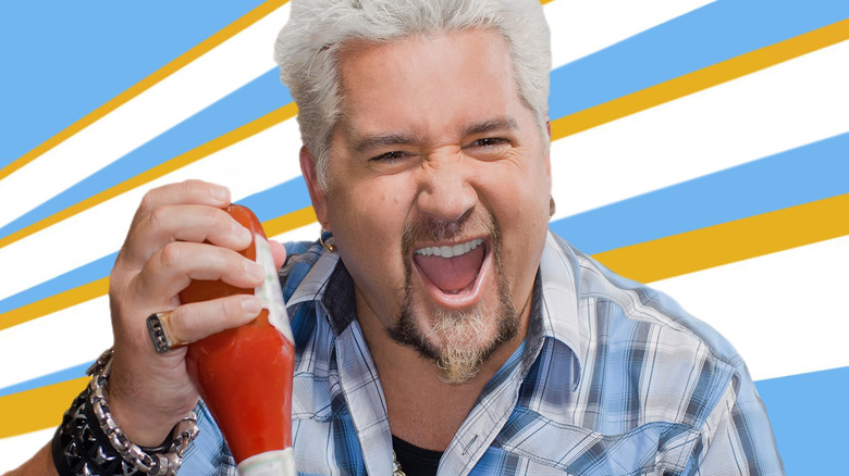 A promotional still of Guy Fieri