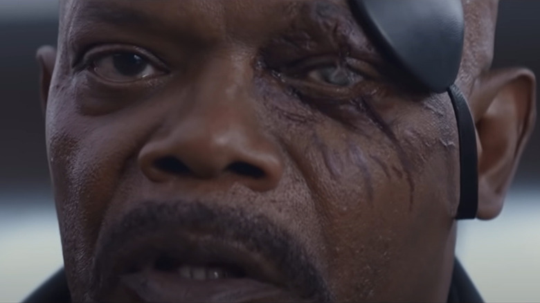 Nick Fury taking off eyepatch