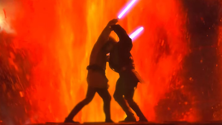 Anakin and OBI-Lan wrestling during their dueling on Mustafar at Star Wars: Revenge of the Sith