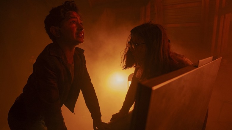 Arian S. Cartaya's Rich Santos stands opposite Matilda Lawler's Marge Truman during the Black Spot fire in It Welcome to Derry