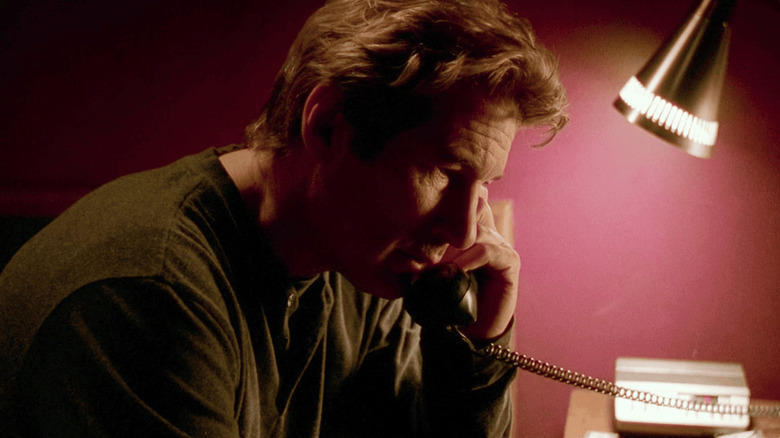 John Klein on the telephone with the Mothman in The Mothman Prophecies