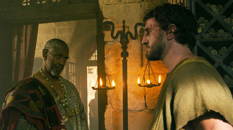 Denzel Washington as Macrinus eyes Paul Mescal as Lucius in Gladiator II