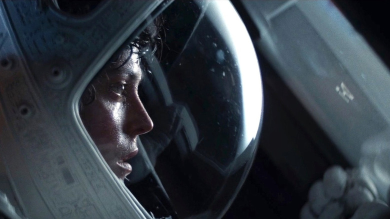 Ripley (Sigourney Weaver) stares out into space in Alien (1979) 