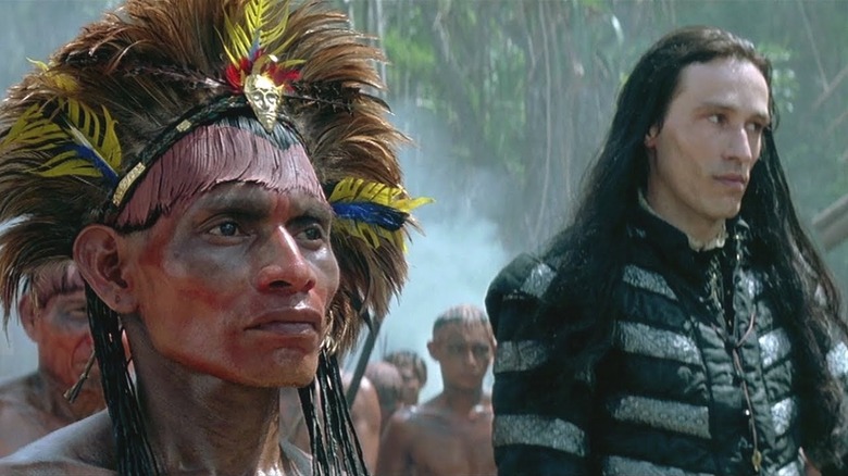 An Indigenous American and Adrien de Moxica standing side by side in 1492: Conquest of Paradise