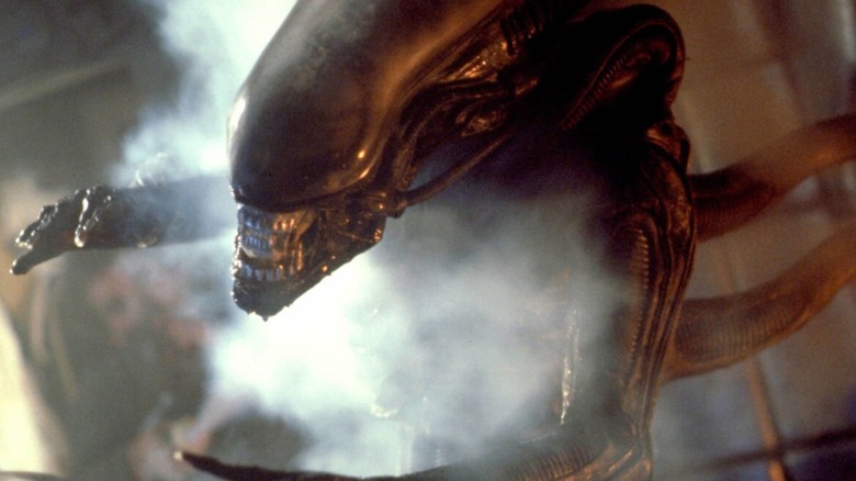 The Xenomorph bares its teeth before attacking in Alien