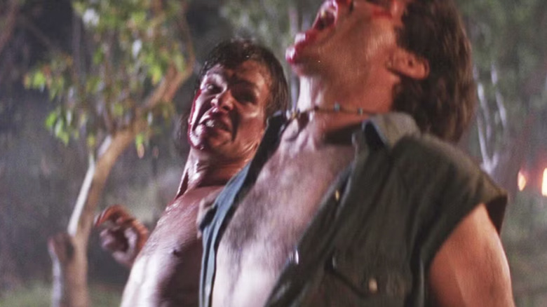 Dalton gets ready to rip out a throat in Road House
