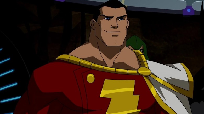 Captain Marvel smiles as he stands next to his superhero peers in Young Justice