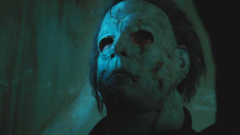 Michael Myers in a dark room in the 2007 version of Halloween