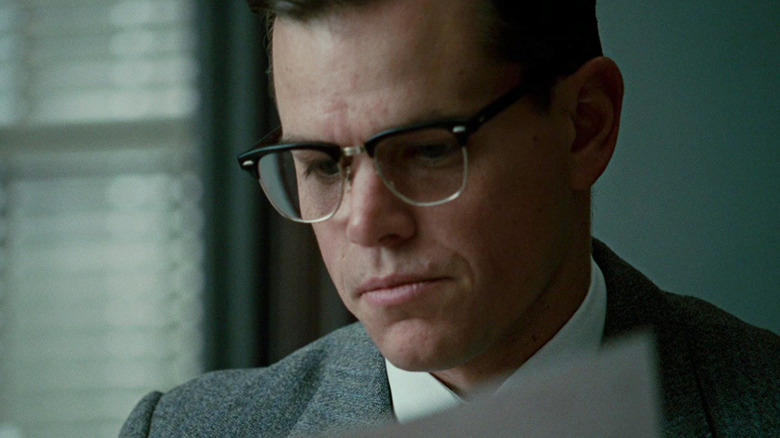 Matt Damon as Edward reading over a paper in The Good Shepherd