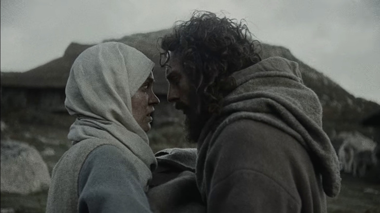 Aaron Taylor-Johnson and Lily Rose-Depp lean in close in Werwulf