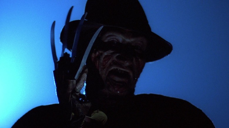 Freddy Krueger displaying his finger knives in A Nightmare on Elm Street