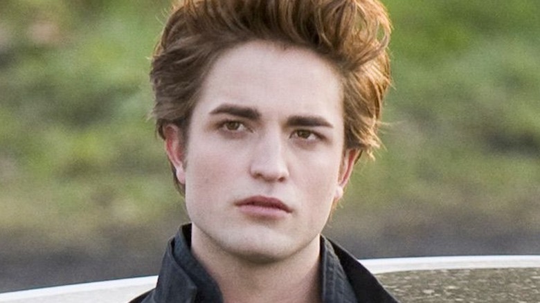 Robert Pattinson is pale and brooding as Edward Cullen in Twilight