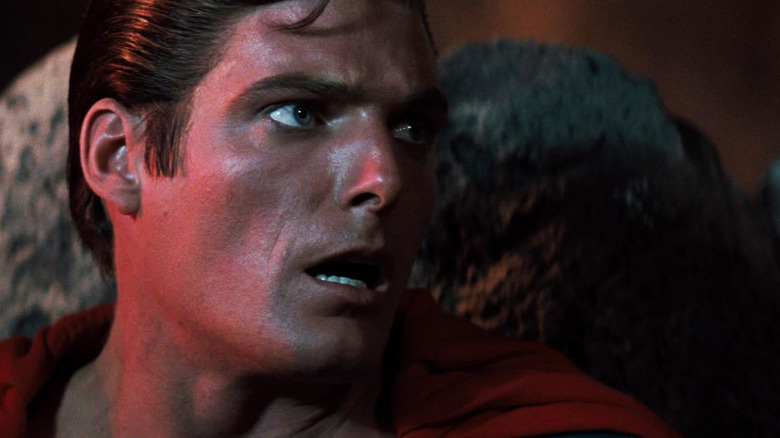 Christopher Reeve's Superman looks off to his left in closeup in Superman III