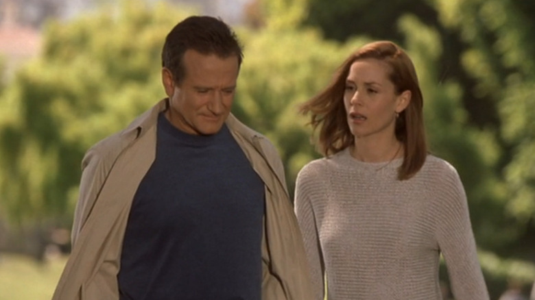 Andrew and Portia walking through a park in Bicentennial Man