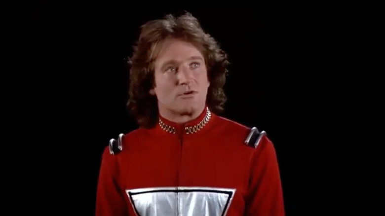 Mork speaking to his superiors