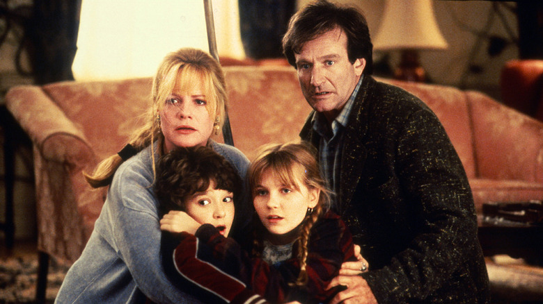 Bonnie Hunt, Bradley Pierce, Kirsten Dunst and Robin Williams in Jumanji